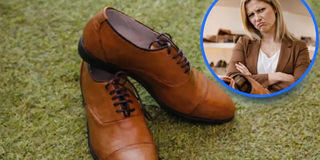 Niezadowolona klientka patrzy na eleganckie brązowe buty na trawie. Czy to problem z gwarancją na buty?